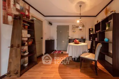 Charming dining area with elegant decor and warm lighting, perfect for cozy gatherings.