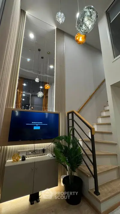 Modern interior with stylish staircase and elegant lighting in a contemporary home
