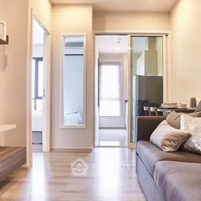 Modern apartment interior with cozy living room and sleek kitchen design