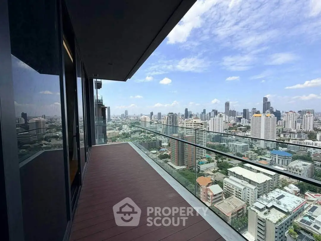 Stunning high-rise balcony with panoramic city skyline views, perfect for urban living enthusiasts.