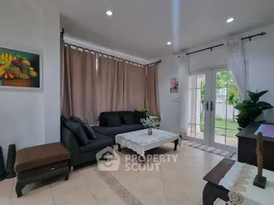 Charming living room with elegant decor and garden view