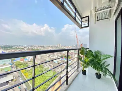 Stunning balcony with panoramic city view and modern railing design.