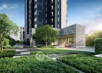 Modern residential building entrance with lush greenery and sleek design.