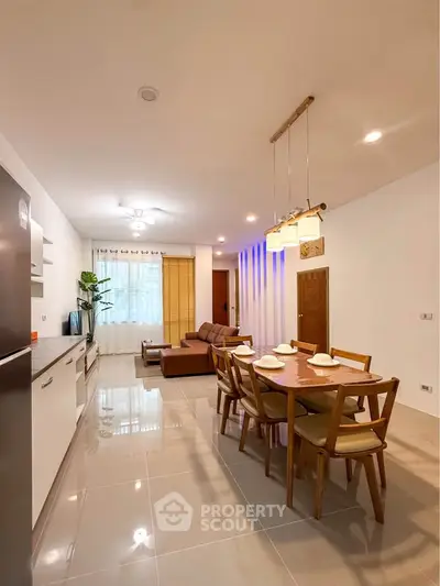 Spacious modern living room with dining area and stylish decor