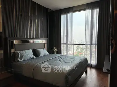 Luxurious bedroom with city view and elegant decor