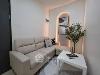 Modern living room with stylish decor and cozy seating area