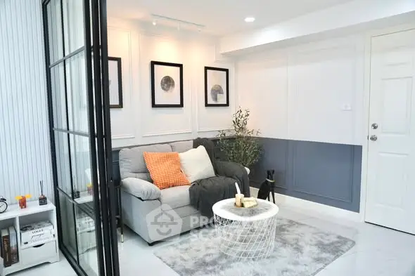 Stylish modern living room with cozy sofa and chic decor