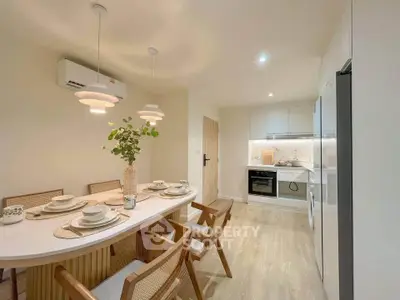 Modern dining area with elegant table setting and stylish kitchen in open layout