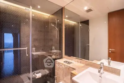 Modern bathroom with glass shower and sleek design