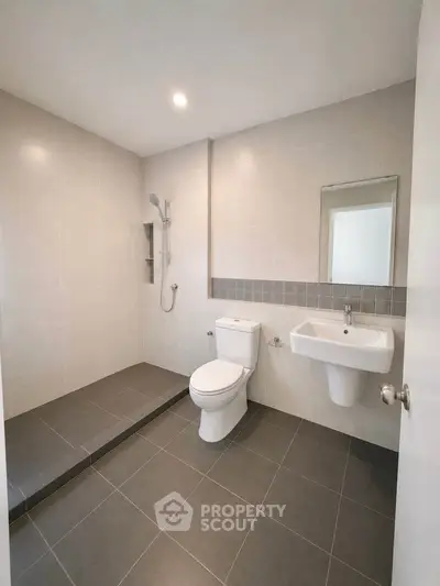 Modern bathroom with sleek design and spacious shower area
