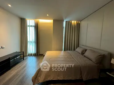Spacious modern bedroom with elegant design and natural light