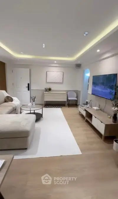 Modern living room with stylish decor and cozy seating area