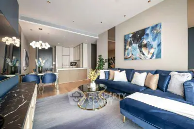 Luxurious modern living room with elegant blue sofa and stylish decor