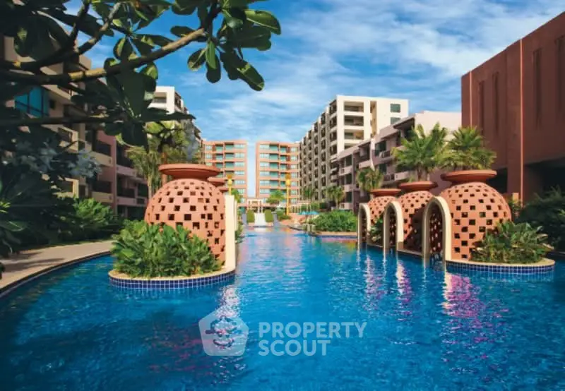 Luxurious resort-style apartment complex with stunning pool and lush landscaping.