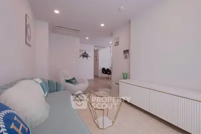 Modern living room with stylish furniture and elegant decor in a contemporary apartment.