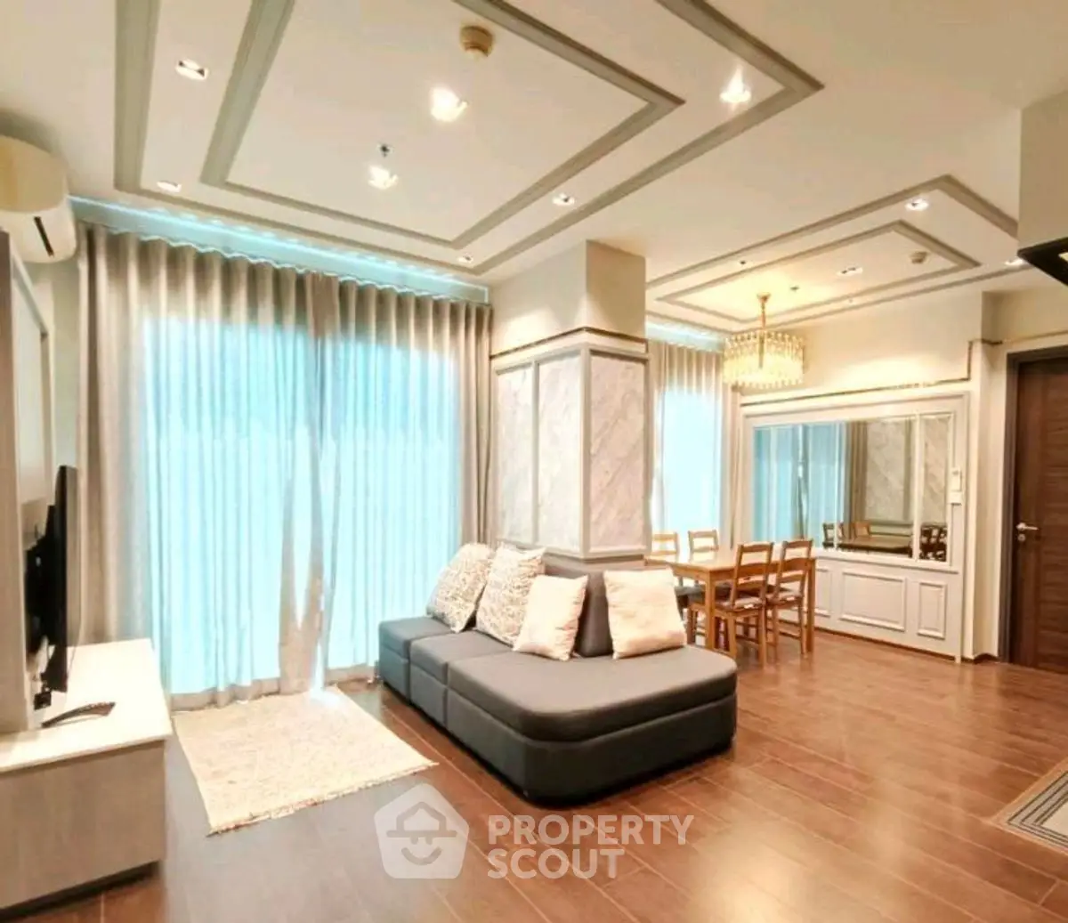 Luxurious living room with elegant decor and ample natural light