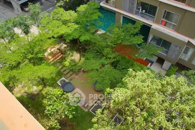 Lush garden view from above in modern residential complex