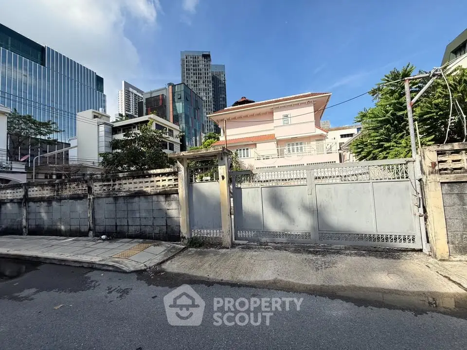 Urban residential area with modern and traditional buildings, showcasing diverse architectural styles.