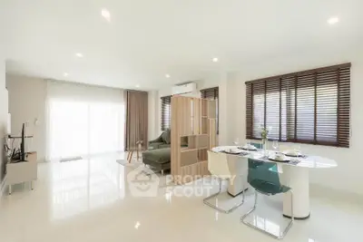 Spacious modern living room with open layout and stylish furniture