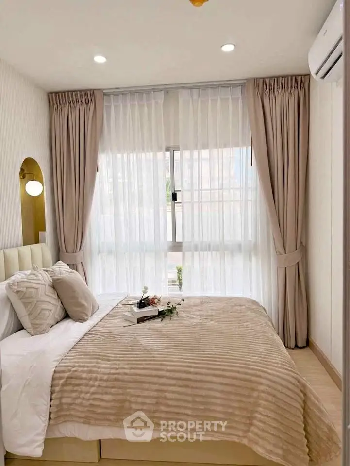Cozy bedroom with elegant decor, featuring a plush bed, stylish curtains, and soft lighting for a serene ambiance.
