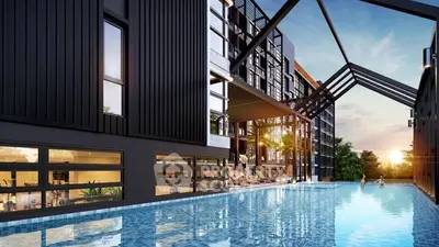 Luxurious modern apartment complex with stunning pool and sunset view.