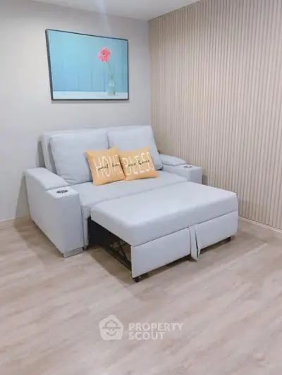 Cozy living room with modern sofa bed and stylish decor