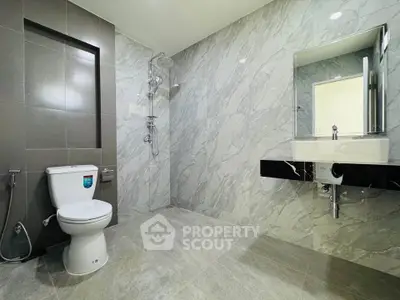 Spacious modern bathroom with sleek design and elegant fixtures