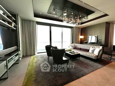 Luxurious living room with modern decor and large windows in upscale apartment