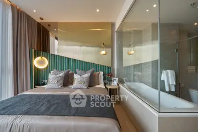 Luxurious bedroom with ensuite bathroom featuring modern design and elegant decor.