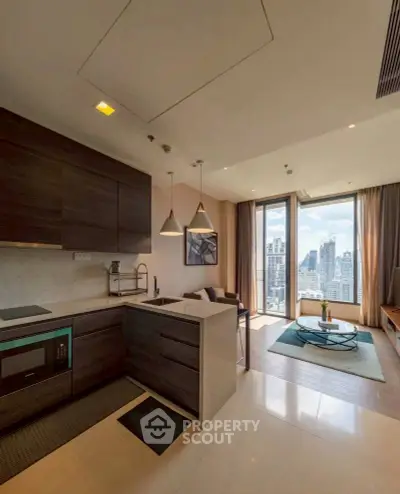 Modern open-plan kitchen and living room with city skyline view