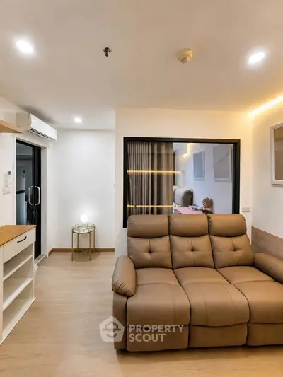Modern living room with cozy leather sofa and stylish decor