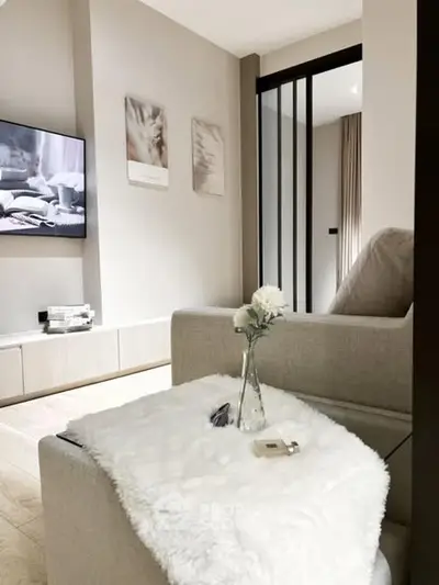 Modern living room with cozy decor and stylish furniture