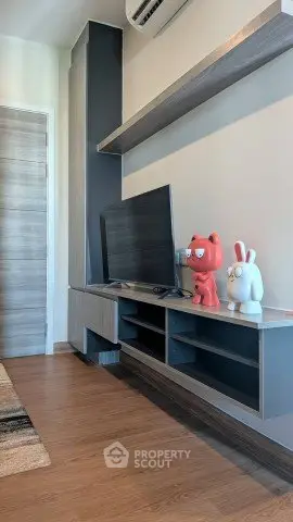 Modern living room with sleek TV stand and stylish decor