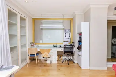 Spacious study room with modern furniture and ample storage space