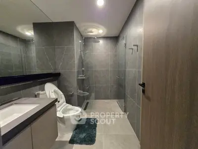 Modern bathroom with sleek design and glass shower enclosure