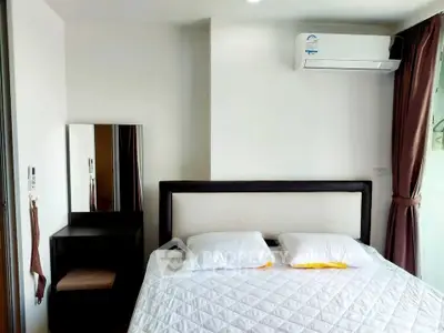 Modern bedroom with air conditioning and stylish decor in a cozy apartment.