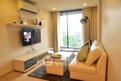 Modern living room with large window and stylish decor