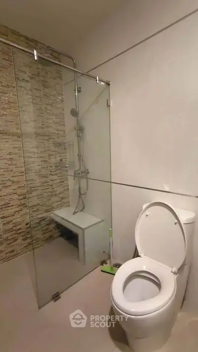 Modern bathroom with glass shower and sleek design