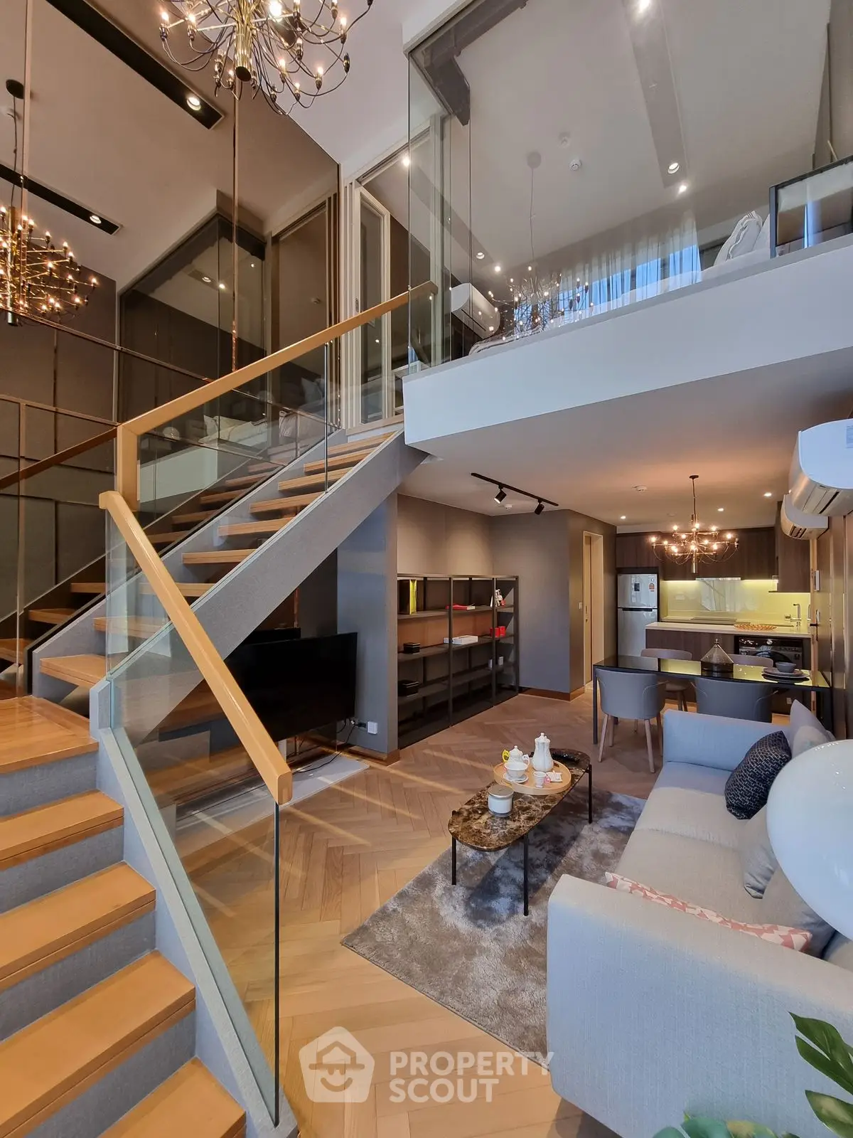Luxurious modern living room with mezzanine, elegant staircase, and stylish decor