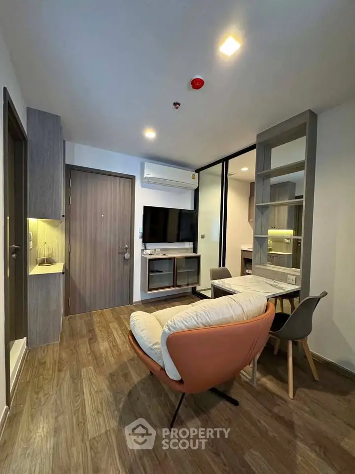 Modern living room with stylish furniture and open layout in a contemporary apartment.