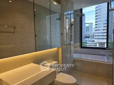 Luxurious bathroom with city view, modern fixtures, and elegant design.