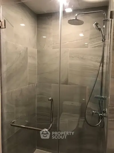 Modern bathroom with sleek shower design and elegant tile work