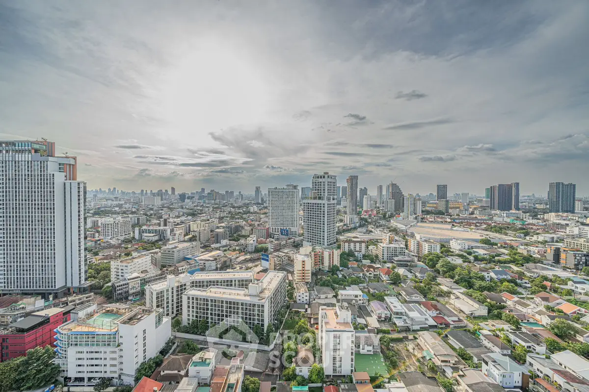 Stunning cityscape view from high-rise building showcasing urban skyline and architecture.
