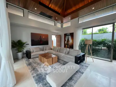 Luxurious modern living room with high ceilings and elegant decor