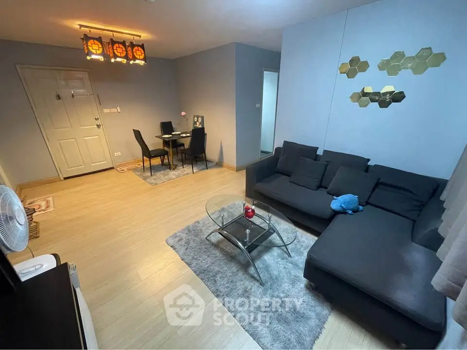 Modern living room with stylish decor and cozy seating area