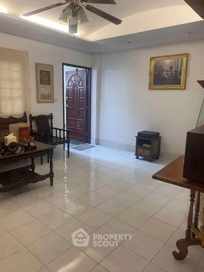 Charming living room with classic wooden furniture and elegant decor