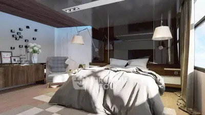 Luxurious modern bedroom with stylish decor and ample natural light