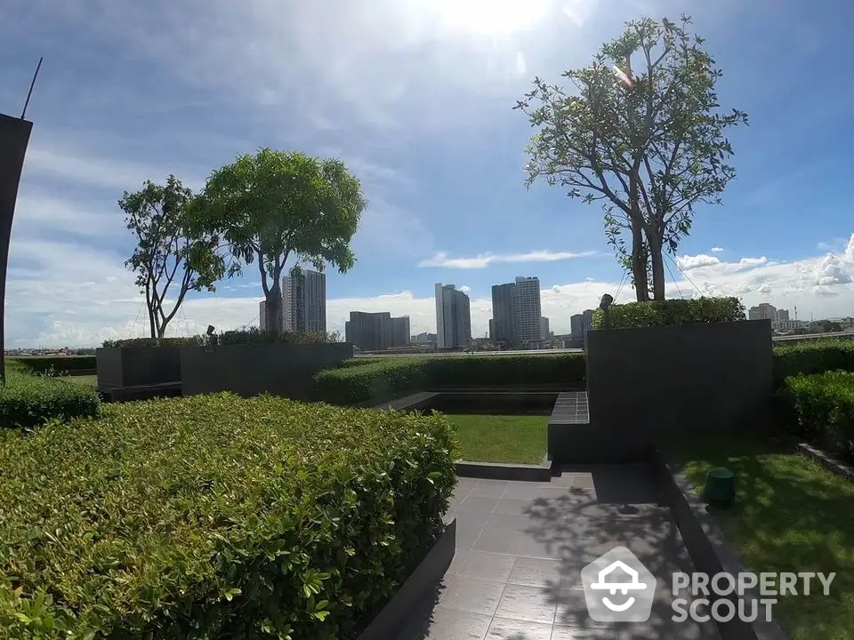 Stunning rooftop garden with city skyline views and lush greenery.