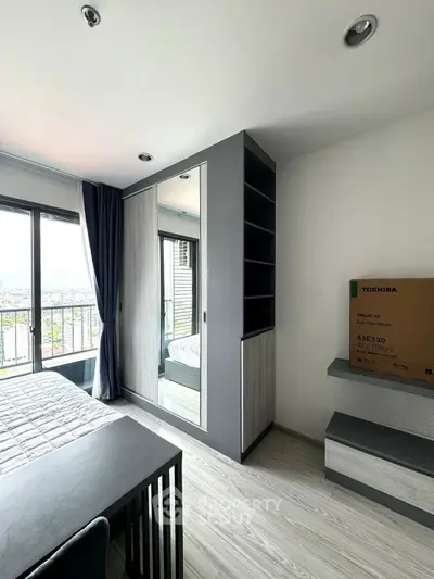 Modern bedroom with city view and sleek furniture design