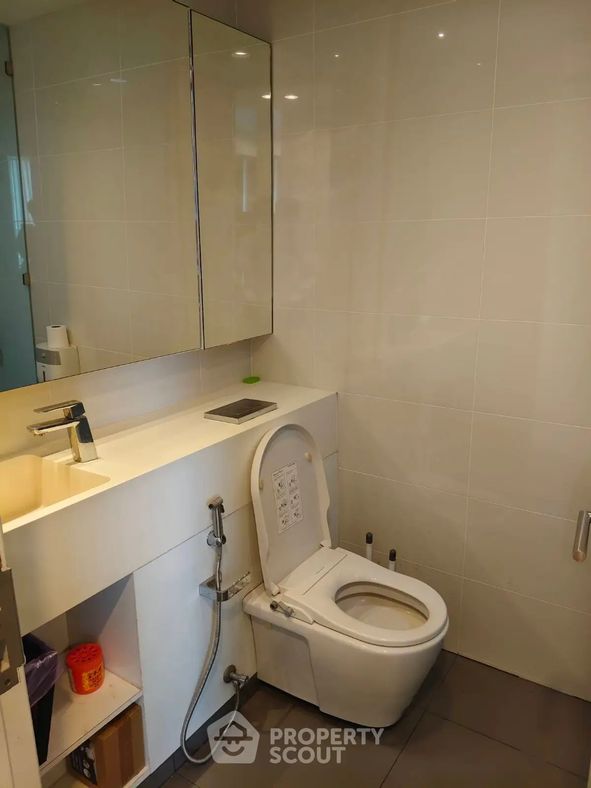 Modern bathroom with sleek fixtures and ample storage space